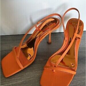 Revolve x Jennifer Lopez Orange Stiletto Heels with Slingback Design